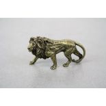 Miniature bronze/brass lion figure