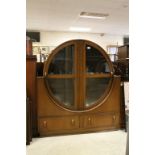 Art Deco Oak Display Cabinet of Circular Form and Two Drawers below, 137cms high x 121cms wide