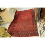 Eastern Bokhara Red Ground Wool Rug, approx. 258cms x 163cms