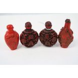 Four cinnabar lacquer snuff bottles