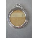 Small circular Hallmarked Silver photograph frame with Bow to top & hallmarked for Birmingham