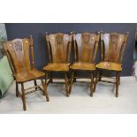 Set of Four Oak Dining Chairs with Solid Seats and Backs, the backs carved in relief with Lion