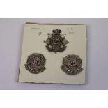 A Victorian QVC The Border Regiment Officers Silver Cap Badge And Pair Of Collar Badges.