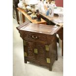 Chinese Hardwood Altar Table / Cabinet with a single drawer above two panel cupboard doors with