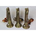 A Collection Of The British Military Bugle's, All Adorned With Military Badges To Include One To The