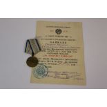 A Russian / Soviet World War Two / WW2 Defence Of Caucasus Medal Complete With Original Issue