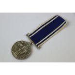 A Full Size British For Exemplary Police Service Medal Issued To Constable JOHN UNWIN.