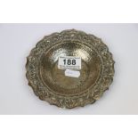 Continental silver bowl with hammered decoration and floral decorated surround, impressed 800 to