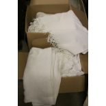 Two boxes of linen and woolen blankets