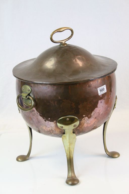 Arts & Crafts lidded Copper Coal Bucket with four Brass feet, twin handles and fixed lid handle,