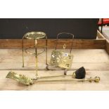 19th century cast iron and brass fire side trivet and one other 3 legged brass trivet and a