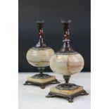 Pair of Cloisonné and onyx bottle vases on stands