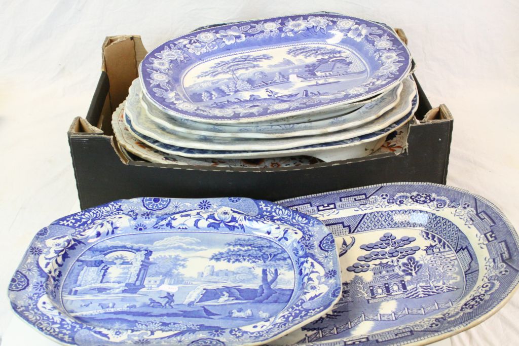 Large quantity of 19th century blue & white meat plates to include willow pattern