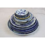 Group of oriental and Delft blue & white bowls and chargers to include 19th century Chinese bowls