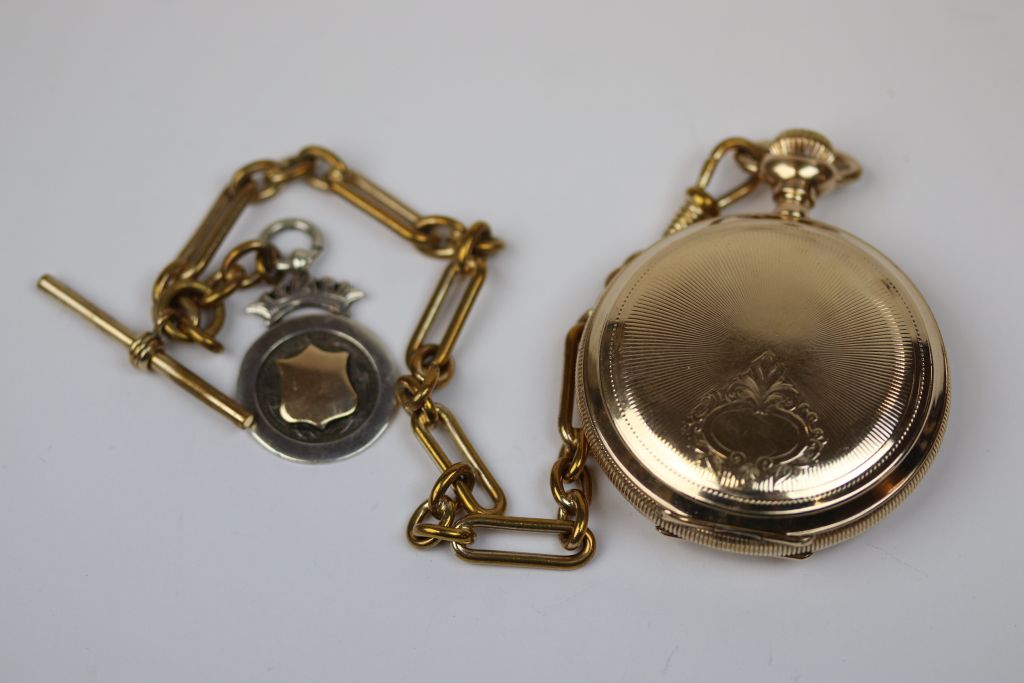 Gold plated Waltham full hunter pocket watch with Albert chain and bar together with a silver