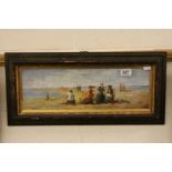 Framed oil painting of a Victorian beach view with figures looking out to sea