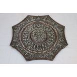 Vintage star shaped copper Asian charger decorated with embossed white metal figures