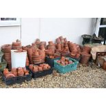 Large quantity of terracotta flower pots
