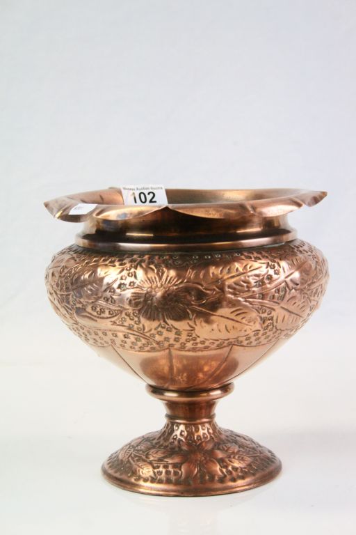 Art Nouveau style copper jardiniere with floral and leaf decoration