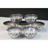 Seven vintage blue & white ceramic Tea bowls with Oriental theme and Gilt detailing, each one approx