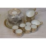 20th century Limoge Arnold Rub floral decorated coffee cups and tea cups and saucers