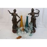 Pair of bronzed spelter musicians together with a group of glassware