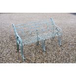 Green painted vintage wrought iron garden bench