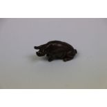 Small bronze pig figure