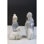 Two Lladro ceramic figurines to include a Girl with Lamb