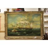 E J Pegrum gilt framed oil on canvas seascape with tall ship and paddle steamer, signed, approx.