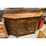 Late 19th century Art Nouveau Oak Sideboard with Three Drawers and Four Cupboards, each with a panel