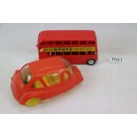 Casdon plastic friction drive bubble car in red and a OK Hong Kong plastic bus in red, gd overall