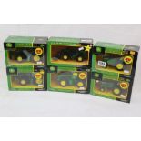 Six boxed 1:43 Britains John Deere tractors to include 42103 7020 4WD, 40923 4020 x 2, 40062