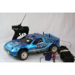 Kyosho RS-200 fuel remote control car together with remote control and accessories.