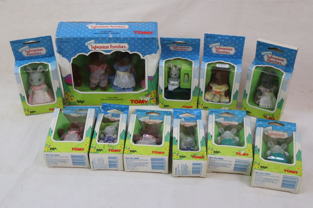 11 Boxed Original Tomy Sylvanian Families figures to include 2810 Bear Family, 2802 x 2, 2862 x 2,