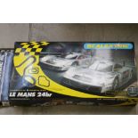 Boxed Scalextric Le Mans 24hr set with slot cars and boxed additional track