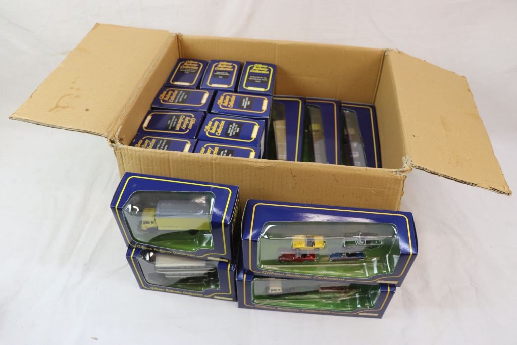 16 boxed Gilbow Railway Collection transport diecast models featuring lorries, cars and buses to