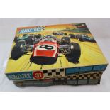 Scalextric - two boxed sets, Sports Set 31 & Set 32, both appear complete, with slot cars and