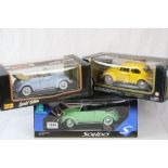 Three boxed 1:18 diecast models to include Solido Prestige 8014 V W Coccinelle (slight dent to box