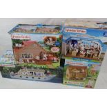 Four boxed Flair Sylvanian Families playsets to include Log Cabin, Pleasure Boat, Cottage Starter