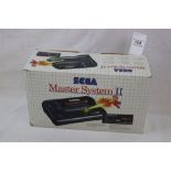 Boxed Sega Master System II console with Alex Kidd In Miracle World built in