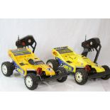 Two Nikko 4WD Dandy Dash off road belt drive electric remote control cars c.1988 together with two
