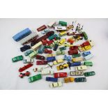 55 Early Matchbox Lesey diecast models plus petrol pumps, in a good play worn condition