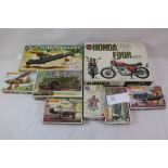 Eight boxed model kits to include Airfix x 4 (1/8 Honda 750 Four, 1/32 Monty's Humber, Diving