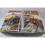 Boxed 1970s Scalextric 600 four lane set to include 7 x slot cars, track and accessories