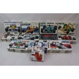 12 boxed 1:20 Tamiya racing car model kits to include 20040 Newman Haas K Mart Texaco Lola T93/00