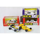 Three boxed SCX slot cars to include Matchbox 83630 Audi 90 Yacco, Exin 83450 Ferrari F40 (Rojo)