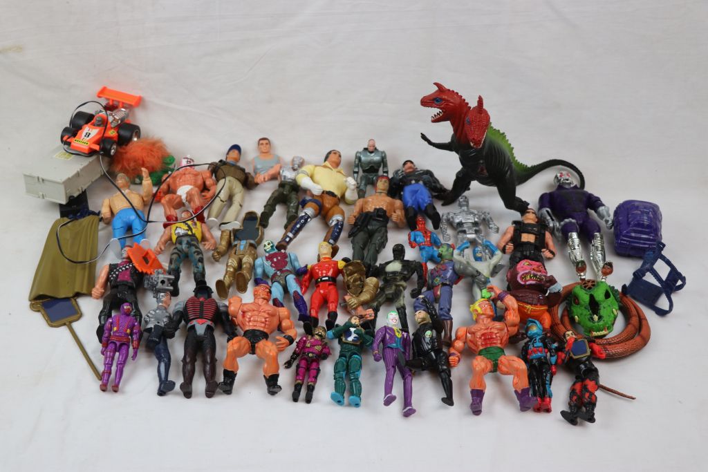 Collection of 80s.90 action figures, toys and accessories to include Terminator, Visionaries, Rambo,