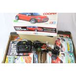 Two boxes of remote control car magazines together with a Tamiya Mini Cooper electric remote control