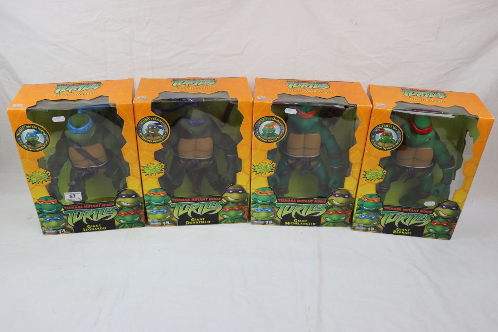 Four boxed Playmates Teenage Mutant Ninja Turtles giant figures to include Raphael, Donatello,